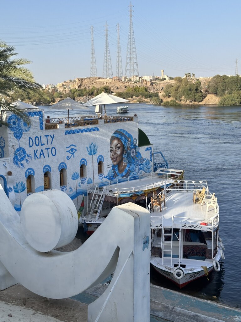 Dolty Kato, Aswan
